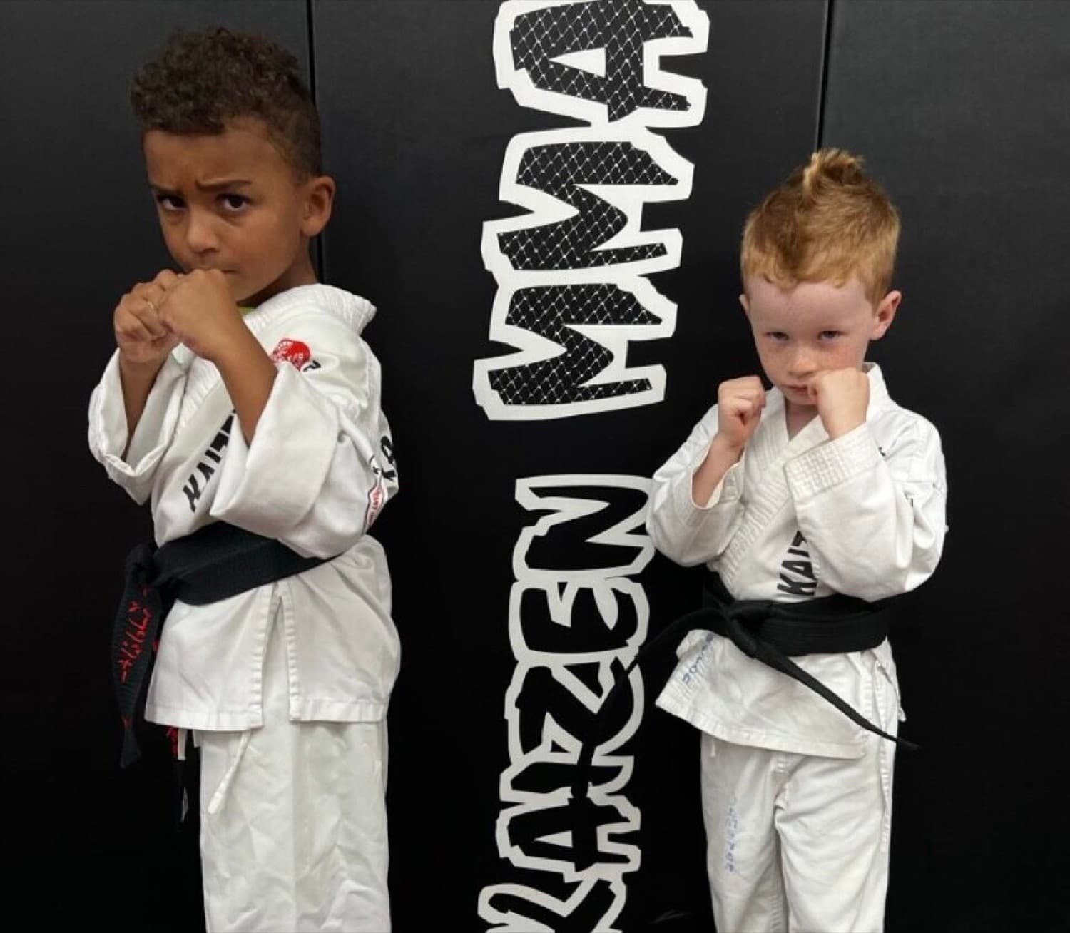 Two young Kaizen students holding a fighting stance at South Riding